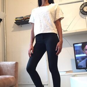 Off white cropped top with‎ 3d detailing